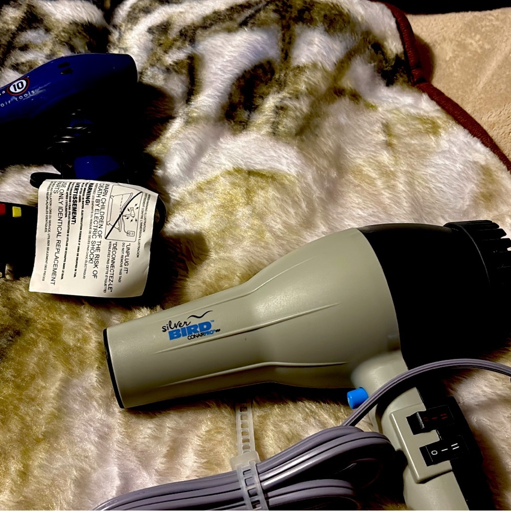 Two hair dryers , new never used
